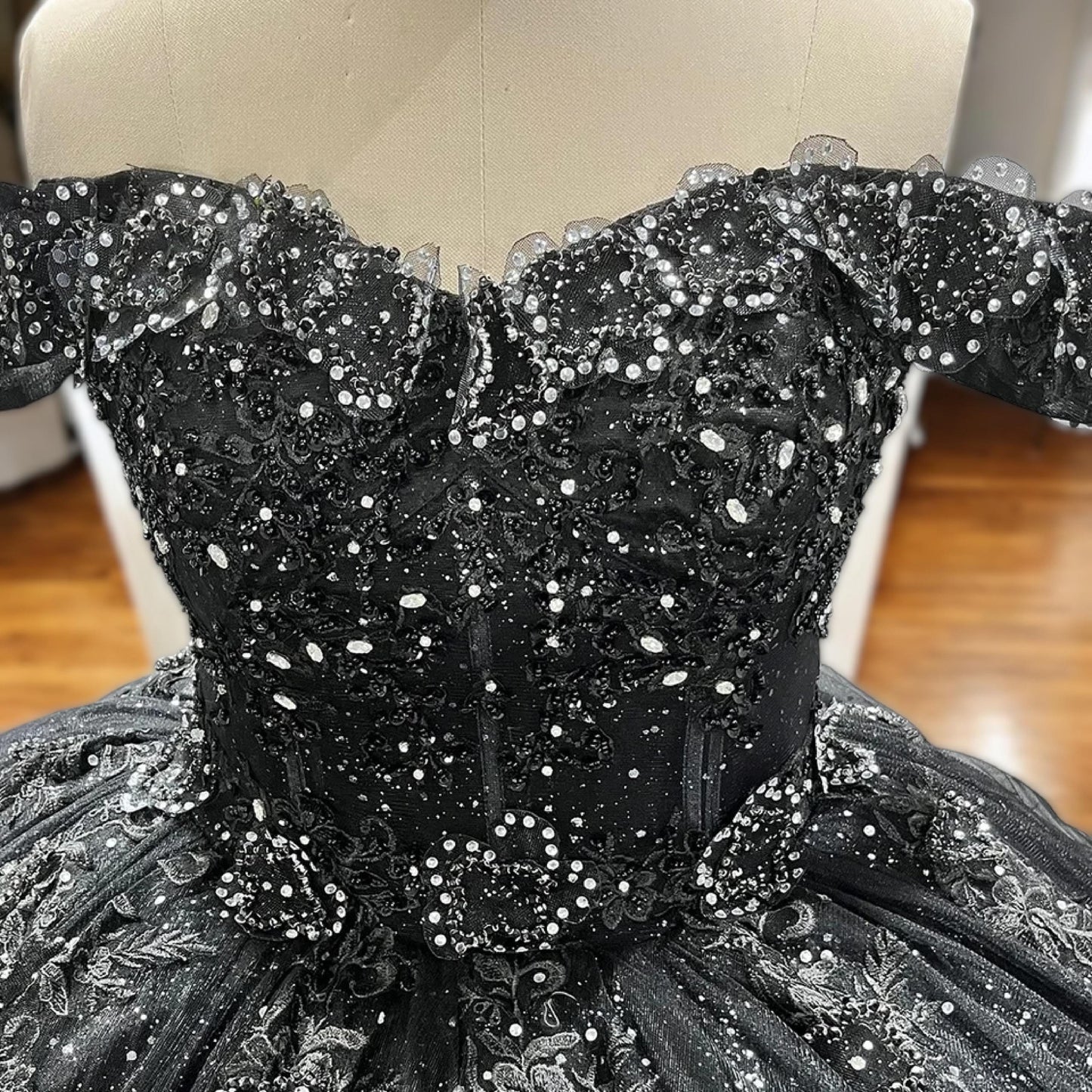 Luxurious Black Gown - Sparkling Off-Shoulder Ball Gown with Sequins and Lace Details