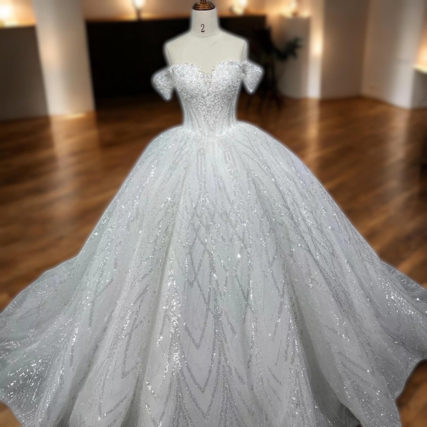 Luxury Off-Shoulder Sequin Embellished Ball Gown | Voluminous Bridal Dress with Sparkling Details | Elegant Fitted Bodice Wedding Gown