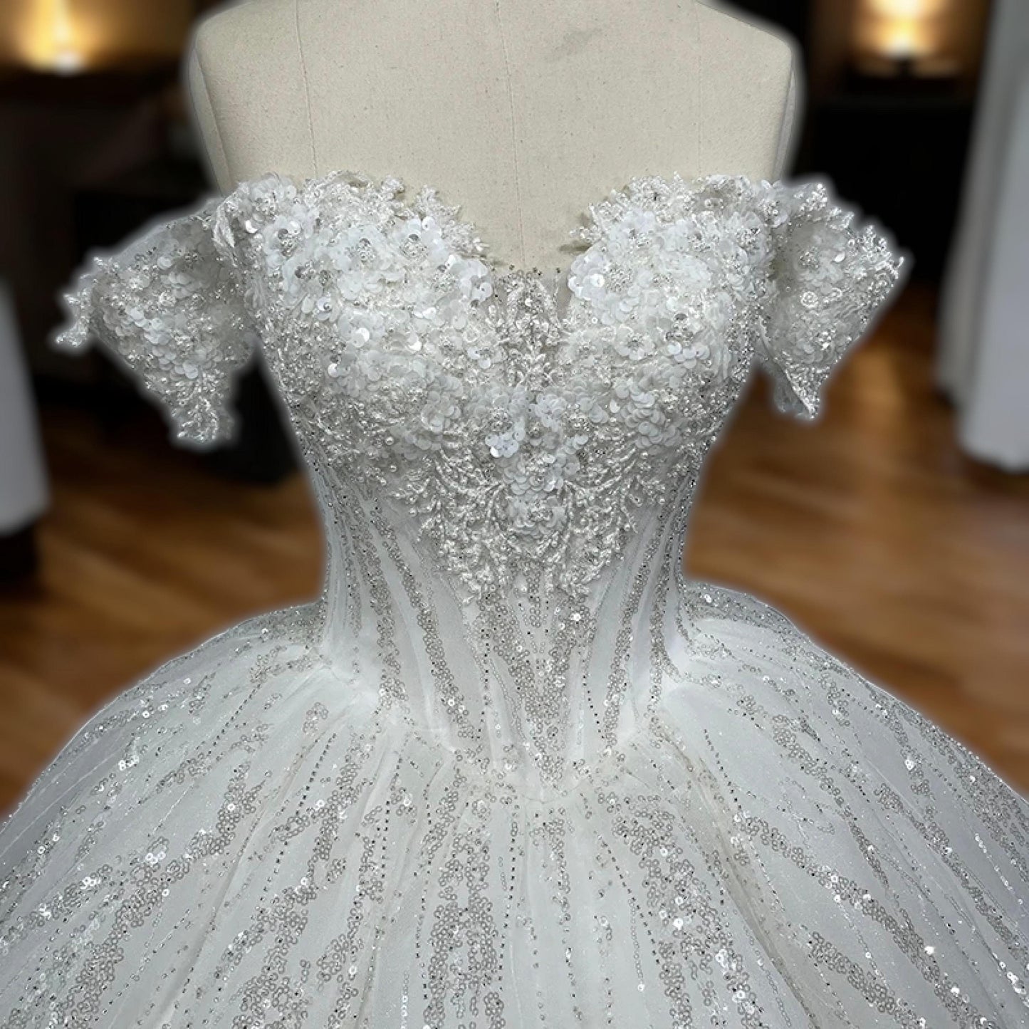 Luxury Off-Shoulder Sequin Embellished Ball Gown | Voluminous Bridal Dress with Sparkling Details | Elegant Fitted Bodice Wedding Gown