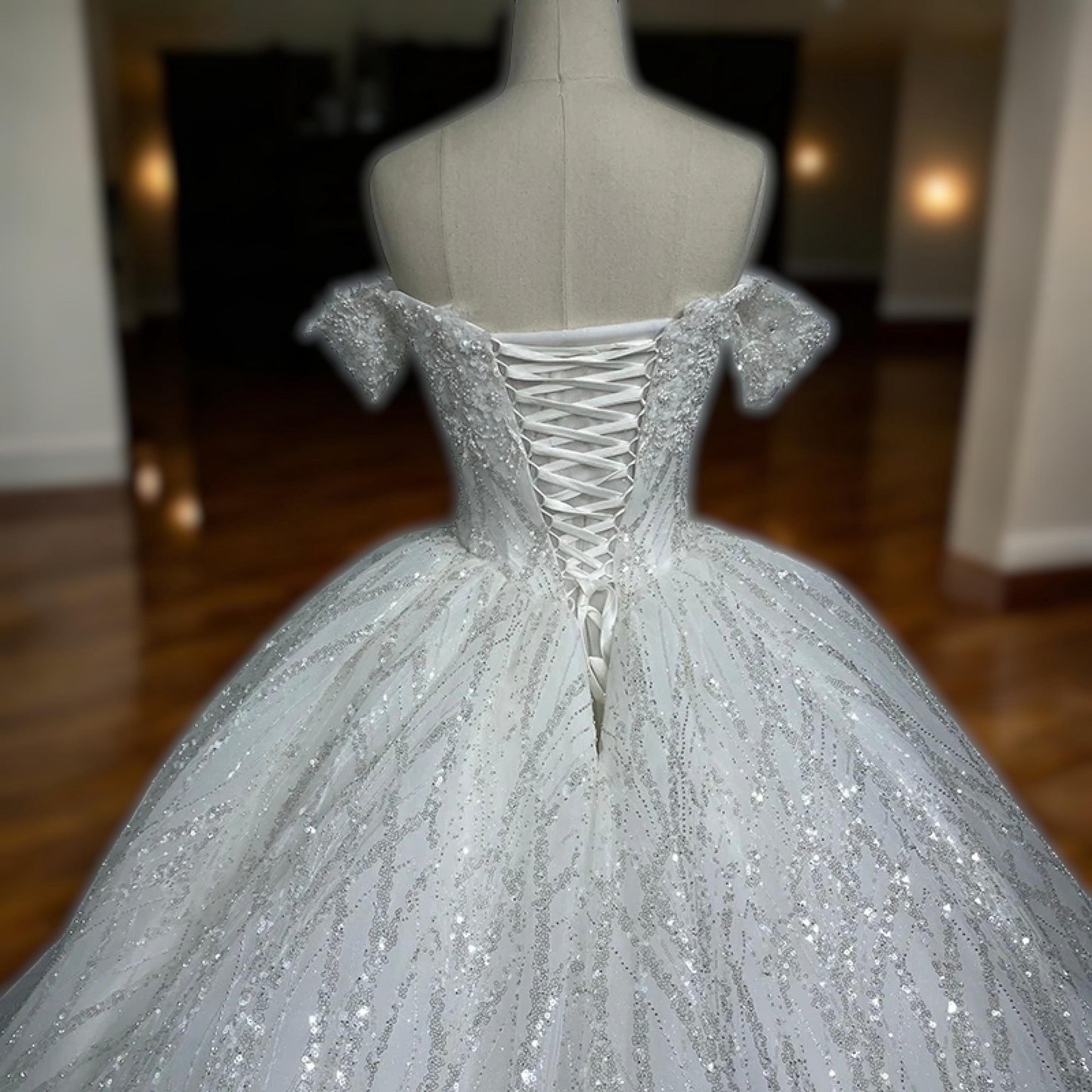 Luxury Off-Shoulder Sequin Embellished Ball Gown | Voluminous Bridal Dress with Sparkling Details | Elegant Fitted Bodice Wedding Gown