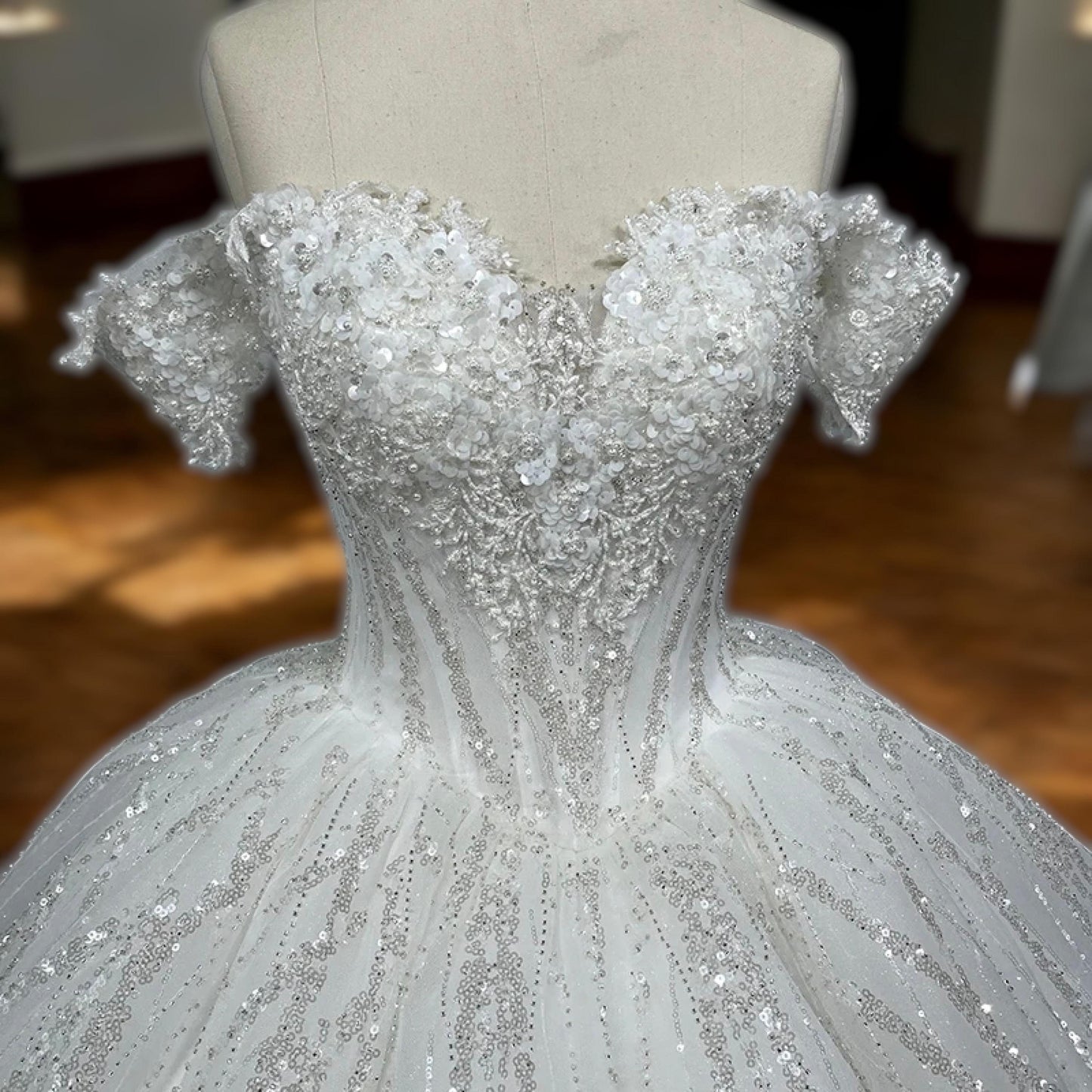 Luxury Off-Shoulder Sequin Embellished Ball Gown | Voluminous Bridal Dress with Sparkling Details | Elegant Fitted Bodice Wedding Gown